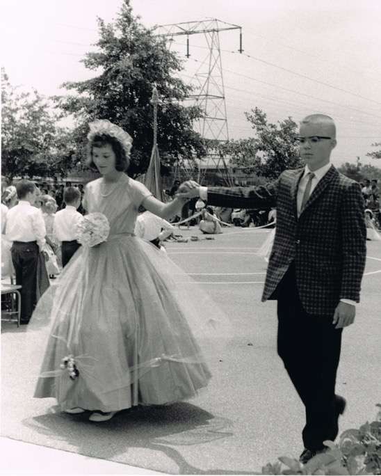 May Festival, 1961. Queen Belva Bell is escorted by Dennis Bane