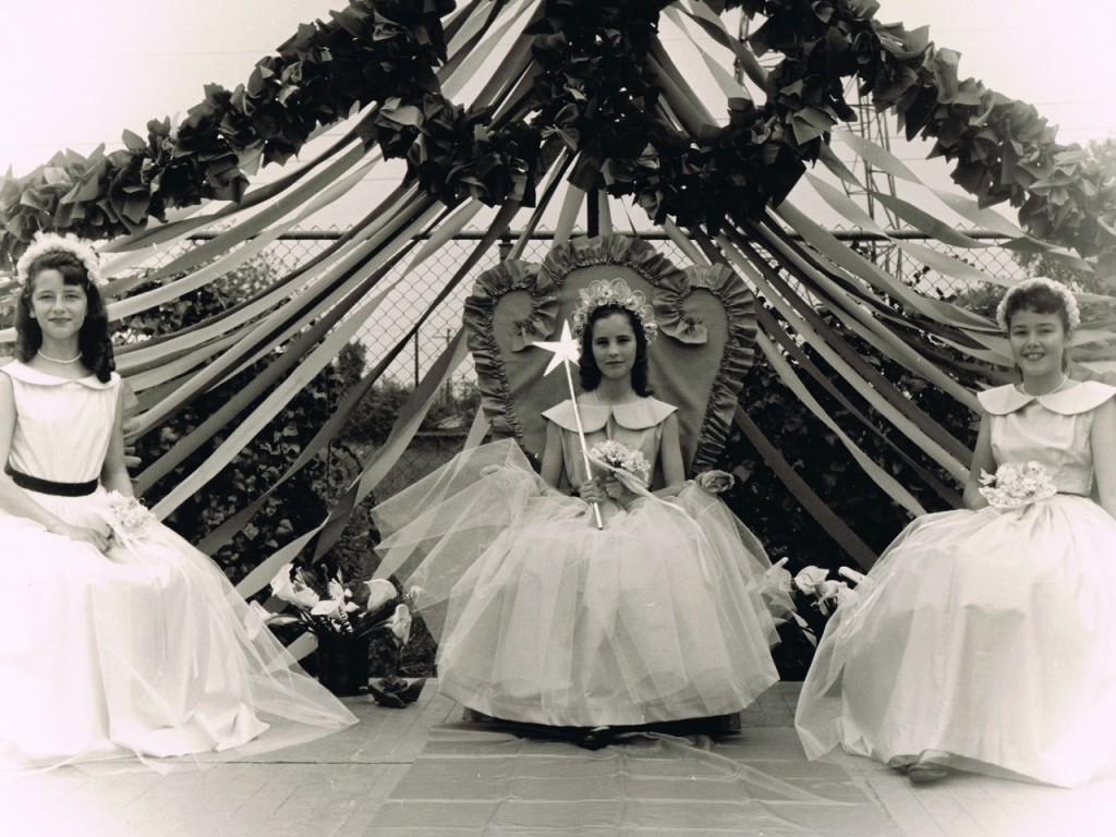 May Festival. 1957. Queen Esther Thorsan, with Princesses Pam Binford on the left and Susie Jacobsen on the right.