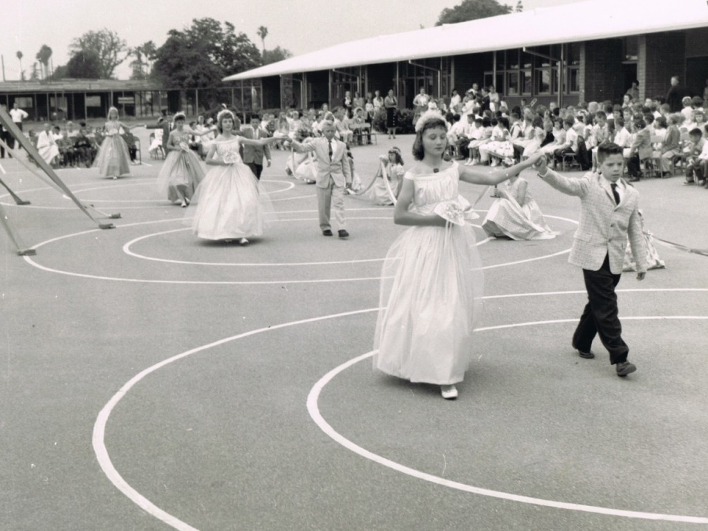 May Festival, 1956. The princesses are being escorted to the stage.